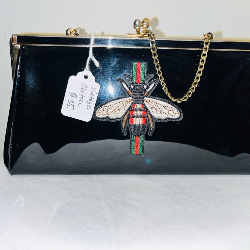 Black Clutch Bag with Embroidered Bee Design